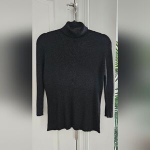 Mantles Black turtleneck with metallic, shimmer, shiny , silver thread